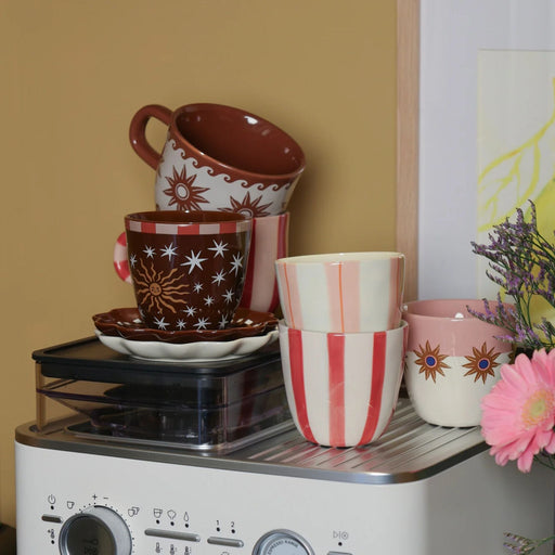 Kop World Cup Brown with Sun and Stars - Mokken - All the Luck in the World