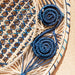 Blue spiral round woven placemats made of natural straw Washein - FOODIES IN HEELS
